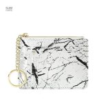 Accessoire chic en cuir pour ranger cartes et billets